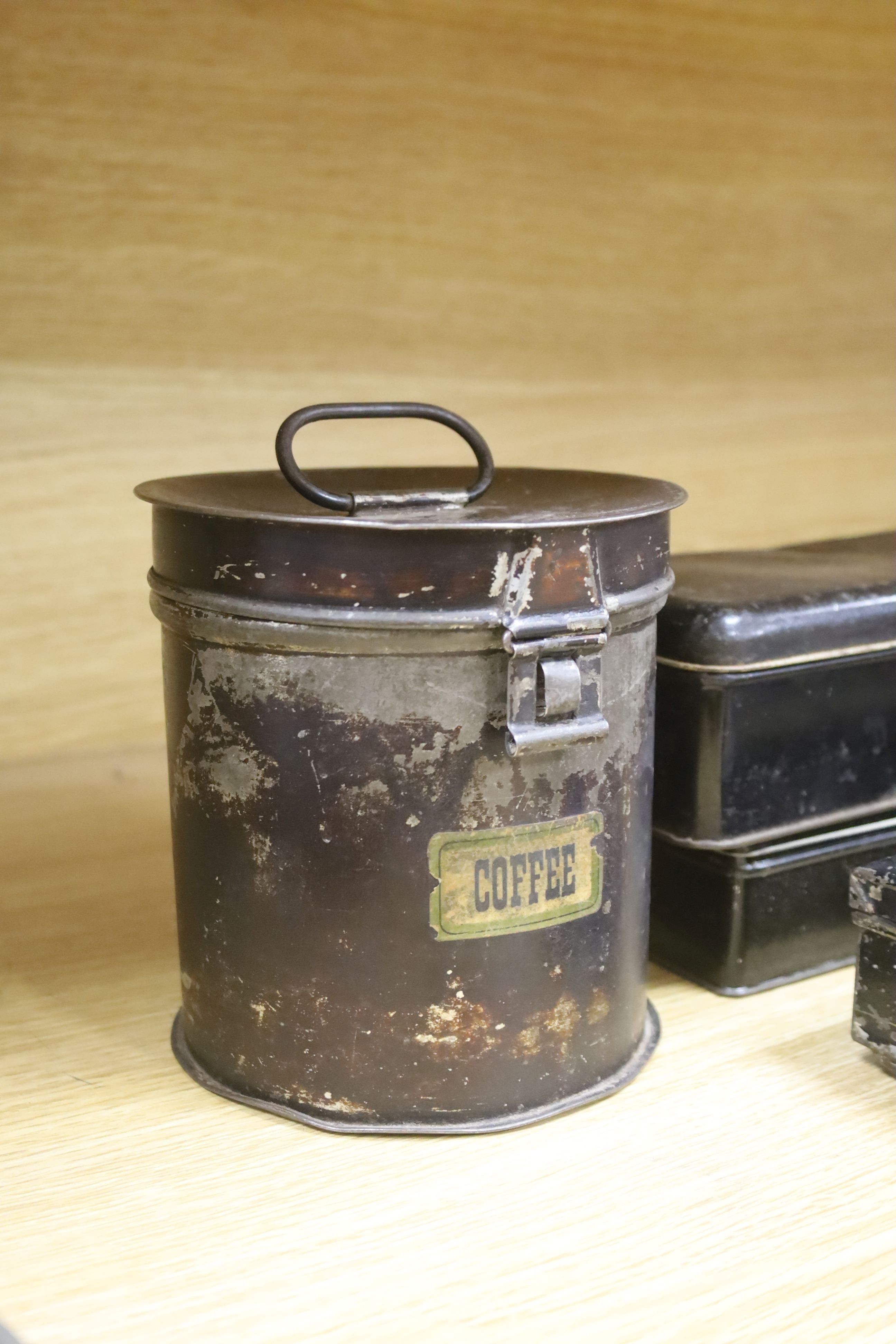 Two 19th century Toleware spice boxes, widest 20cm, and five storage tins